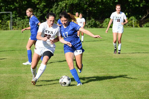 Old Orchard Beach football and girl's soccer