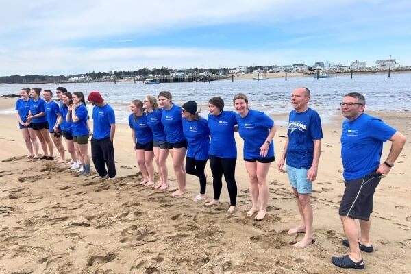 UNE community members take freezing “plunge” to celebrate Giving Day success